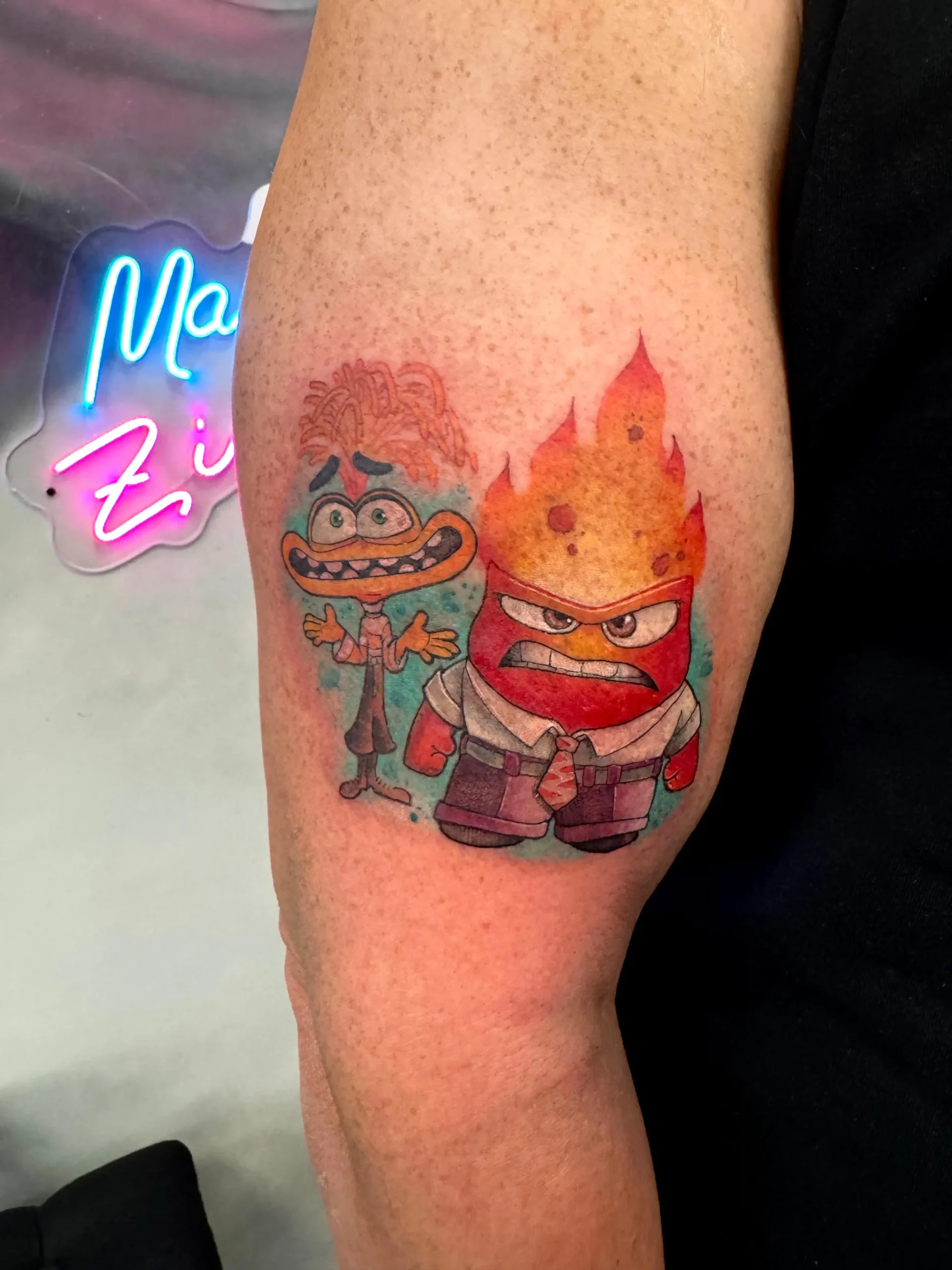 Tatuaje a color Disney Inside Out de Raquel Pertierra en Málaga